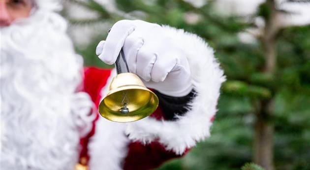 Tannenbaum schlagen - Weihnachtsmann mit Glocke